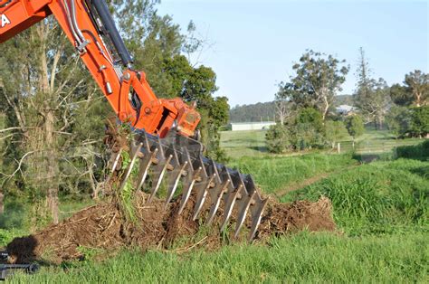 mini excavator rake attachment|homemade mini excavator attachments.